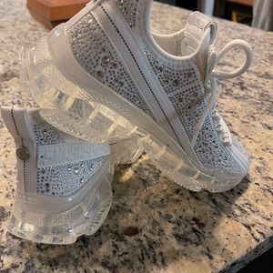 White Maxima Sneaker 8.5 run small